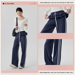 Straight vertical stripes cover the flesh and slim fitness wide-leg pants