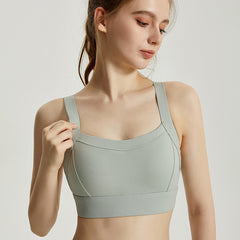 Integrated fixed cup sports bra
