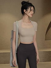 Fake two pieces yoga short sleeve t-shirt with chest pads