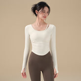 Long-sleeved yoga top with chest pad and beautiful back