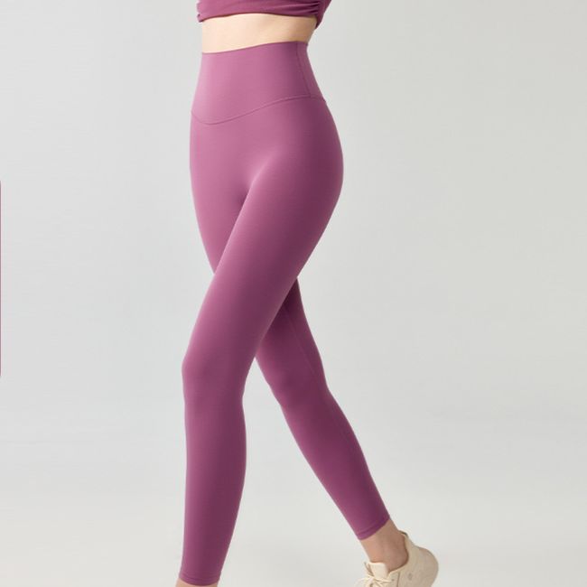 Nude high-rise hip-lifting trousers