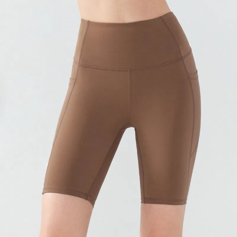 High-rise hip-lifting and double-pocketed cropped pants