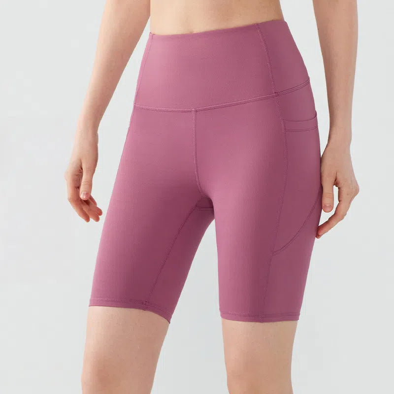 High-rise hip-lifting and double-pocketed cropped pants