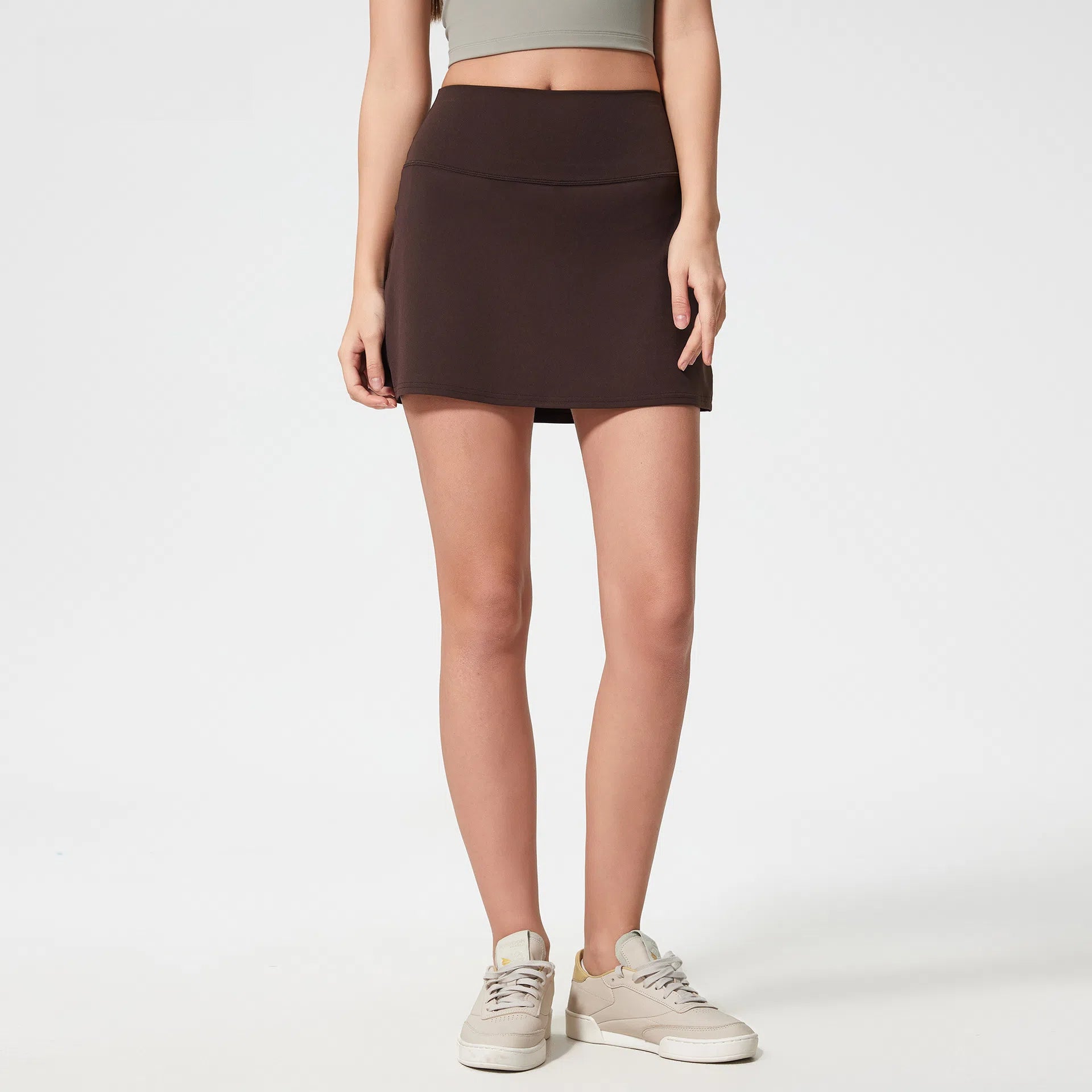 A high-waisted lined anti-walking women's lightweight and breathable tennis skirt