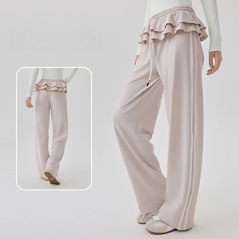 Straight vertical stripes cover the flesh and slim fitness wide-leg pants
