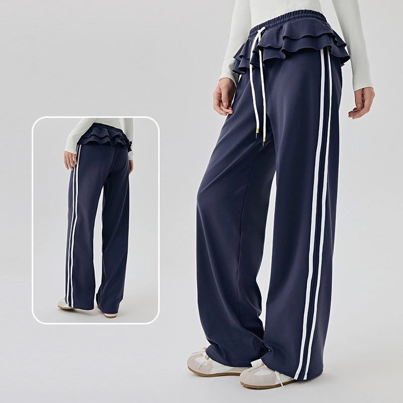 Straight vertical stripes cover the flesh and slim fitness wide-leg pants