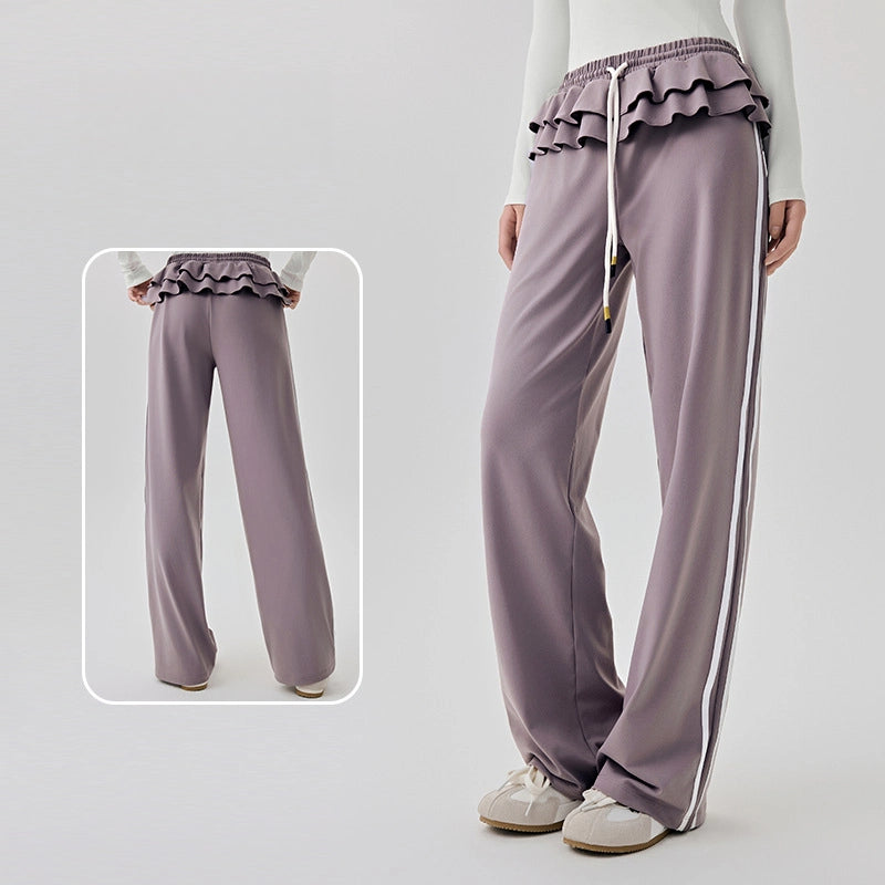 Straight vertical stripes cover the flesh and slim fitness wide-leg pants