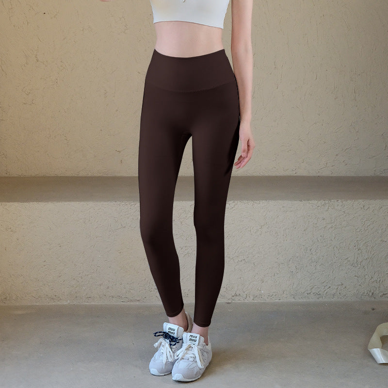 High-waisted nude peach hip lifting leggings