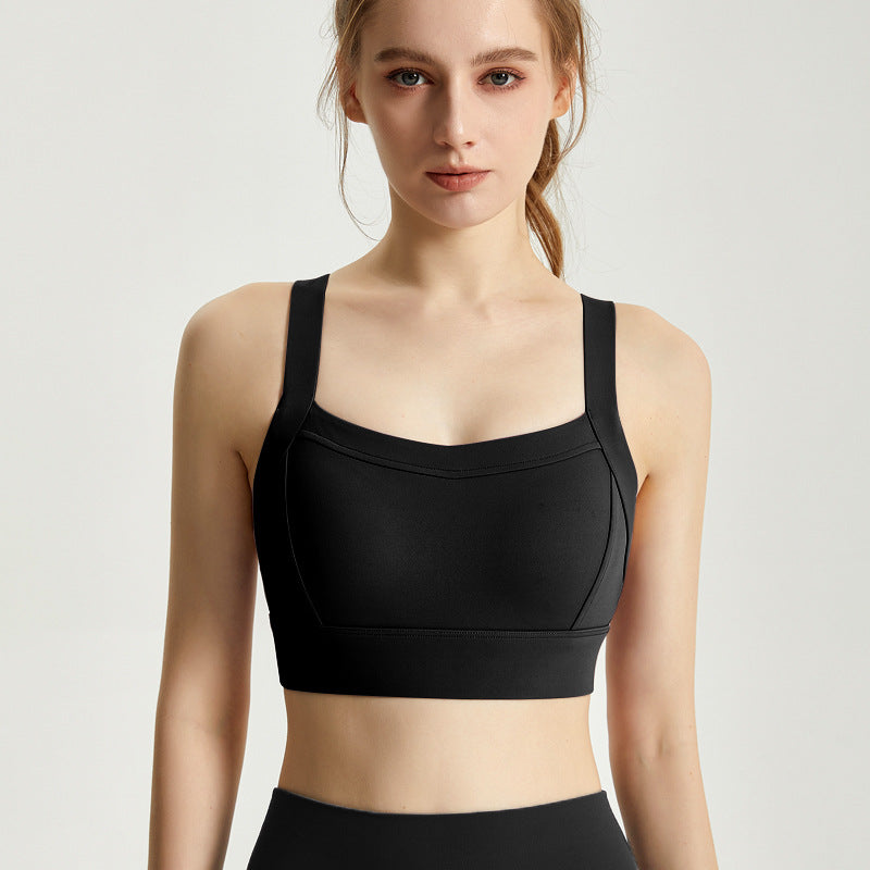 Integrated fixed cup sports bra