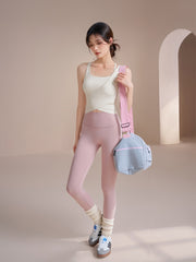 Fitness sports vest with integrated cut-out shoulder straps