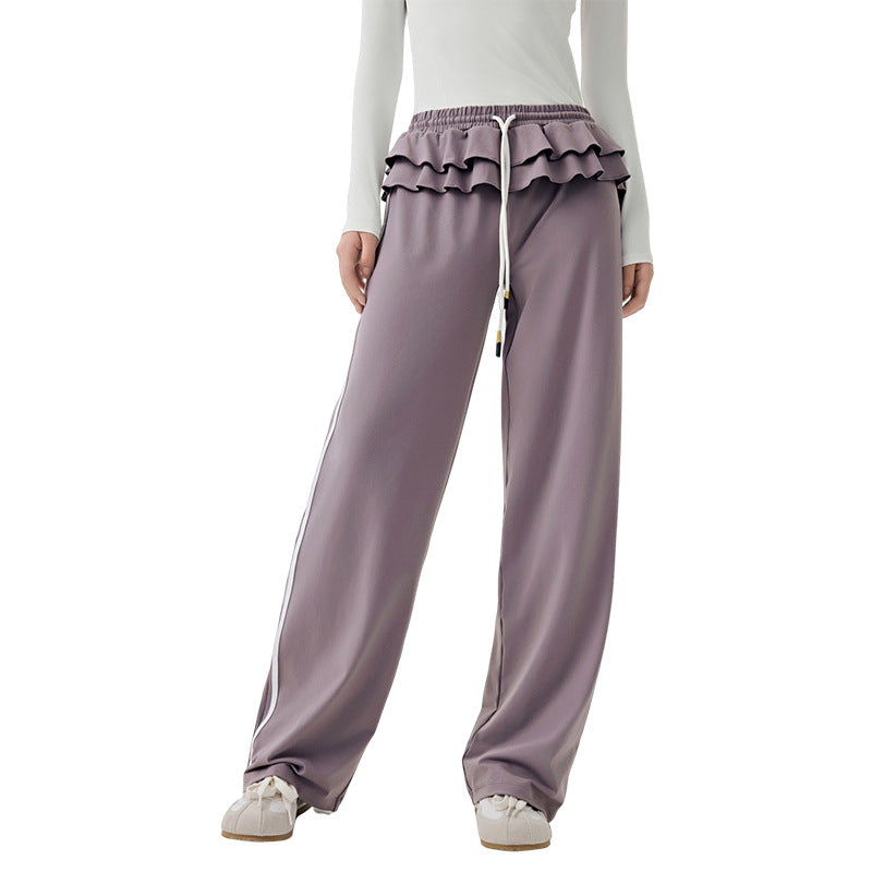 Straight vertical stripes cover the flesh and slim fitness wide-leg pants