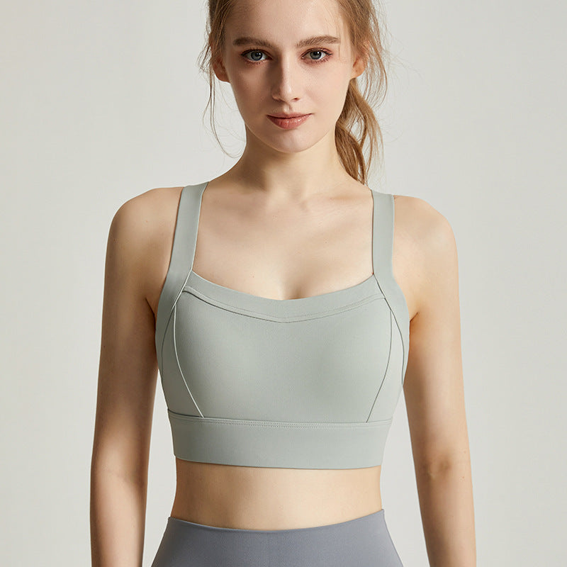 Integrated fixed cup sports bra
