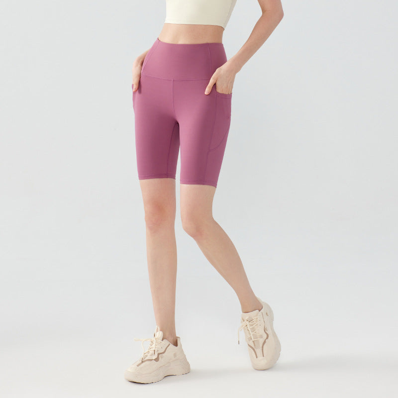 High-rise hip-lifting and double-pocketed cropped pants