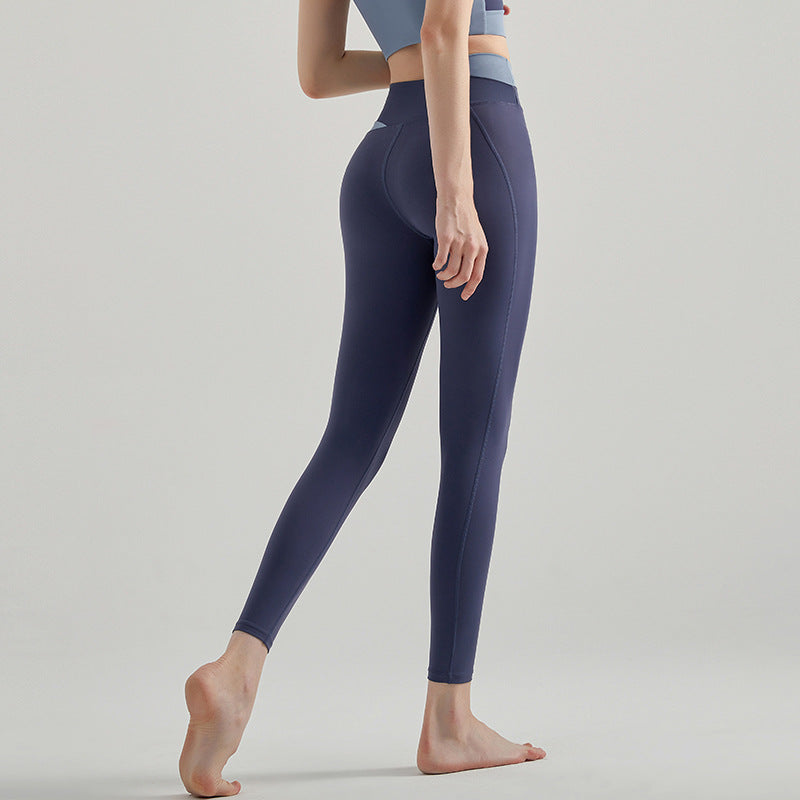 Color-blocked cross-waisted leggings