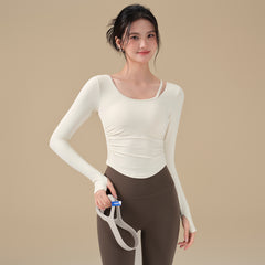 Long-sleeved yoga top with chest pad and beautiful back