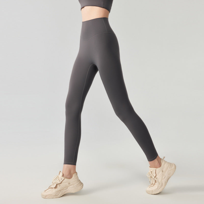 Nude high-rise hip-lifting trousers