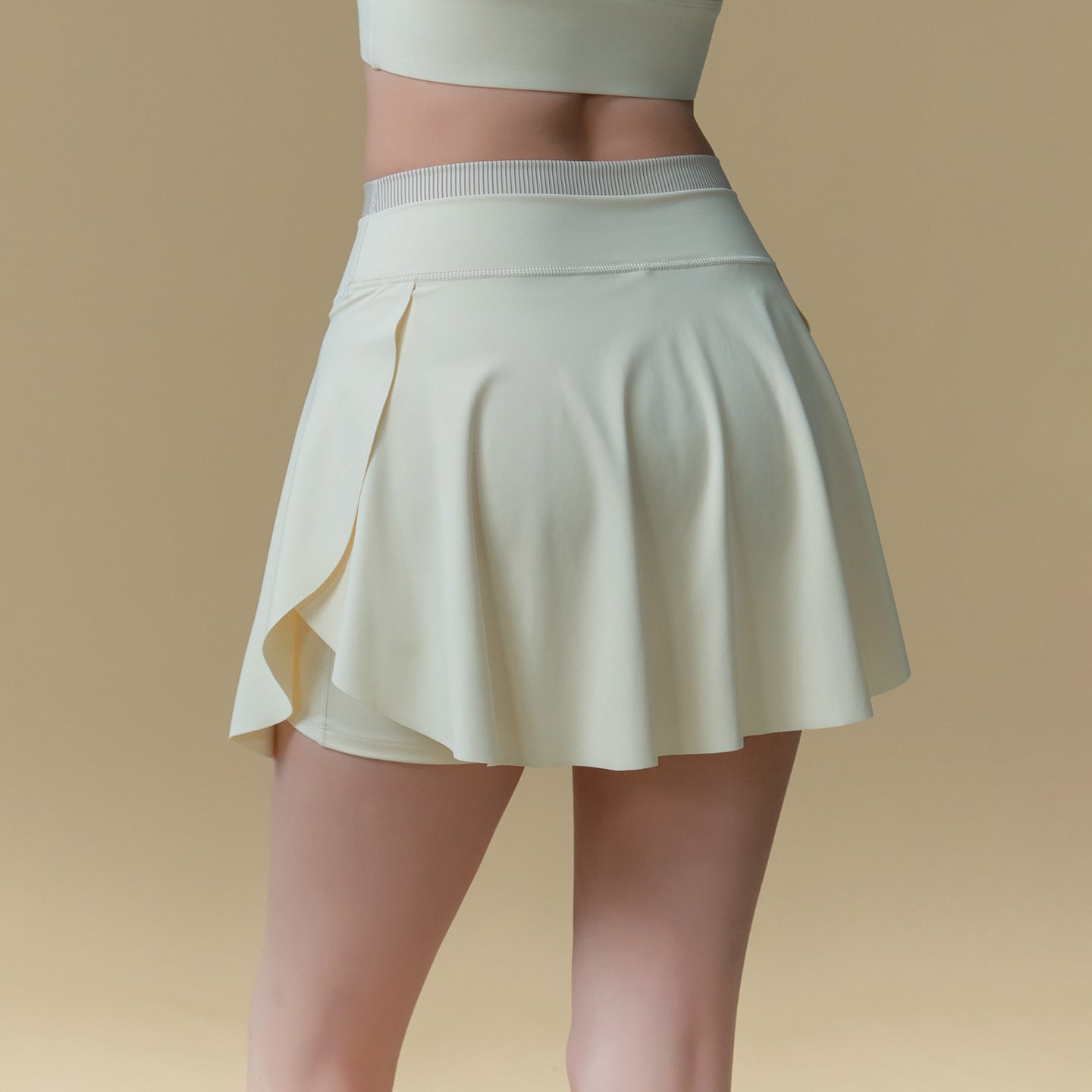 Includes lined anti-shine high-waisted gym skirt