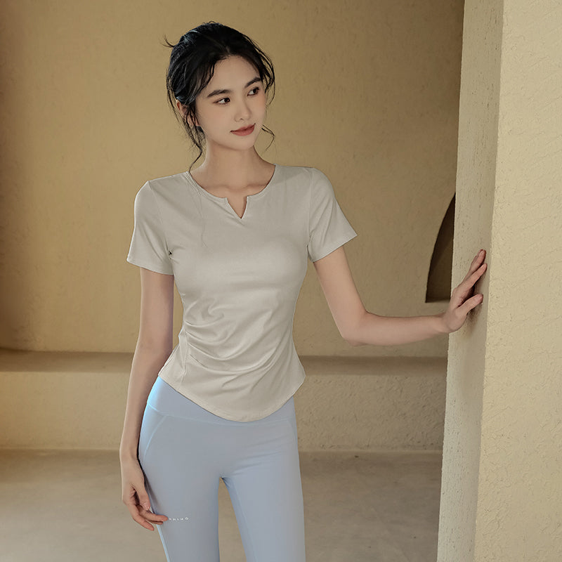 Solid color yoga short sleeve t-shirt with chest pads