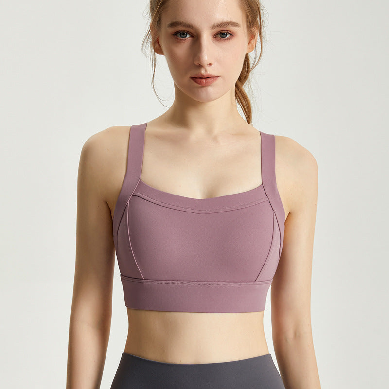 Integrated fixed cup sports bra