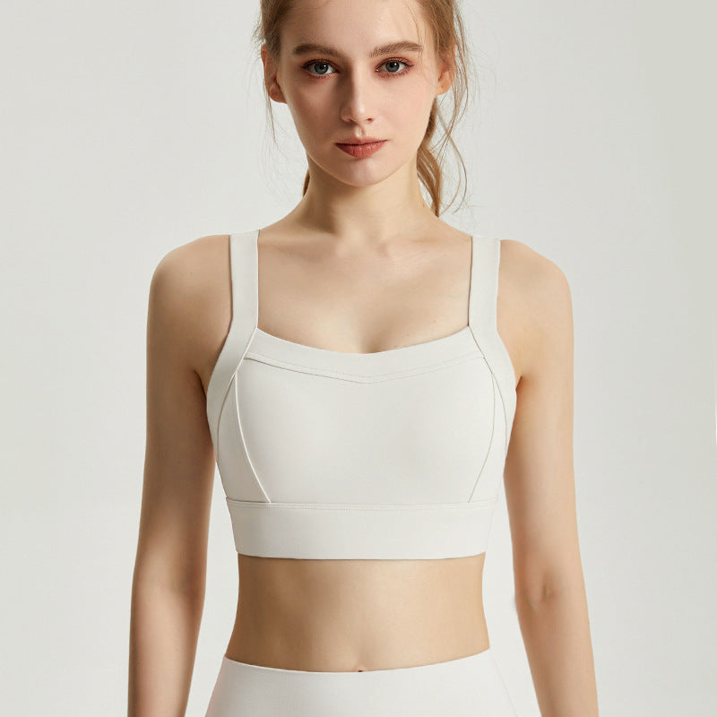 Integrated fixed cup sports bra